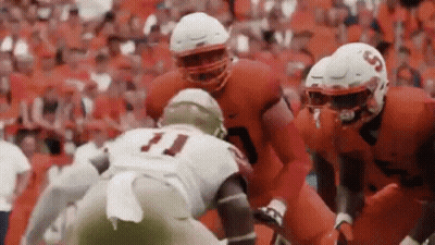 Football Players Playing On Field With Crowd GIF