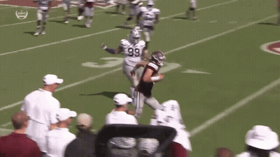 Football Players Playing On Field With Number 3 GIF