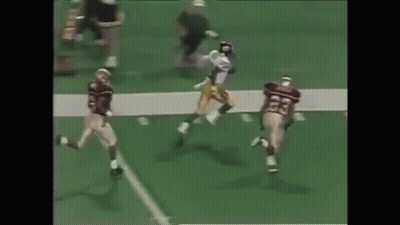 Football Players Playing On Field With Referee GIF