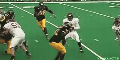 Football Players Playing On Green Field GIF