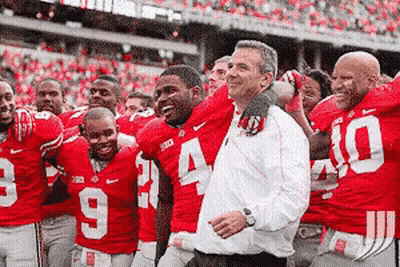 Football Players Posing With Number 10 GIF