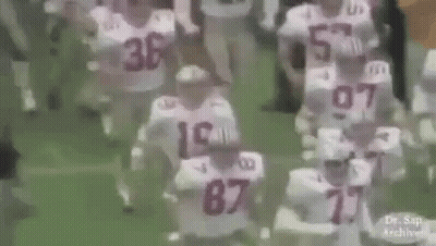 Football Players Running On Field GIF