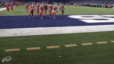 Football Players Running With Buffalo Logo GIF