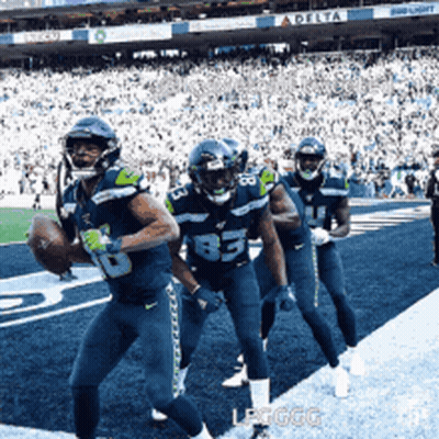 Football Players Running With Delta Ad GIF