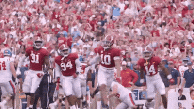 Football Players Running With Number 10 Jersey GIF