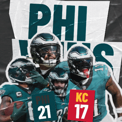 Football Players Standing By KC 17 Sign GIF