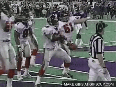Football Players Standing On Field GIF