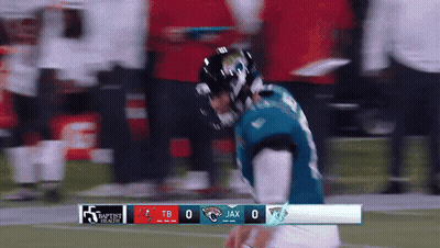 Football Players Standing On Field GIF