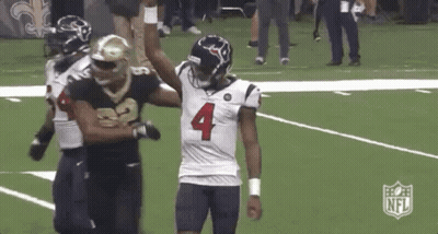 Football Players Standing On Field GIF
