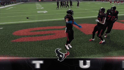 Football Players Standing On Field With Letter T GIF