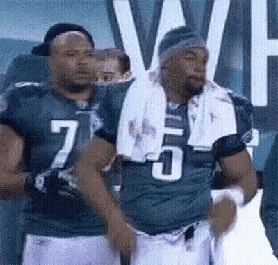 Football Players Standing Together Number 7 Jersey GIF