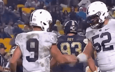 Football Players Standing Together GIF