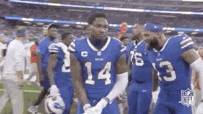 Football Players Walking On Field GIF