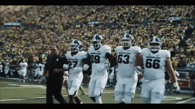 Football Players Walking With Number 69 Jersey GIF