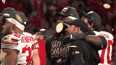 Football Players Wearing National Champs Shirts GIF
