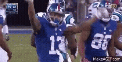 Football Players With Hands In The Air GIF