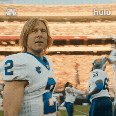 Football Players With Number 66 On Field GIF