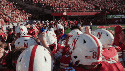Football Players With Number 8 Helmets GIF