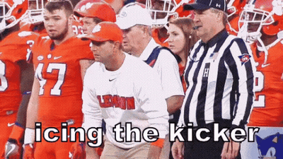 Football Players With Referee Icing The Kicker GIF
