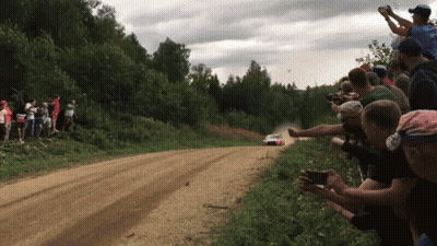 Ford Rally Car Driving Through Field GIF