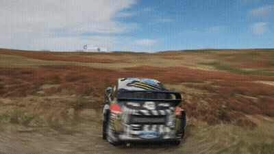 Ford Rally Car Driving Through Field GIF