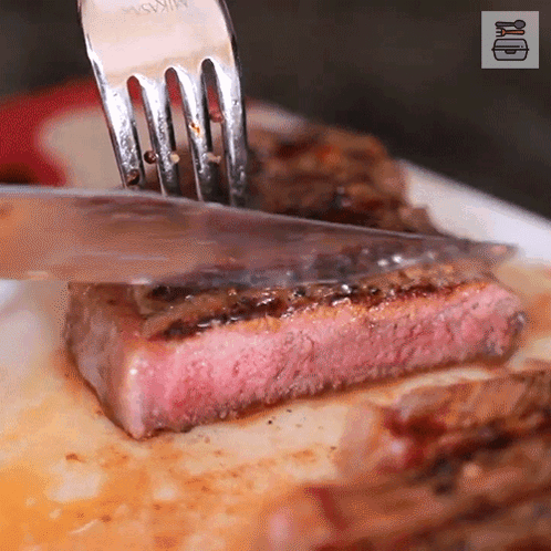 Fork Cutting Meat On White Plate GIF