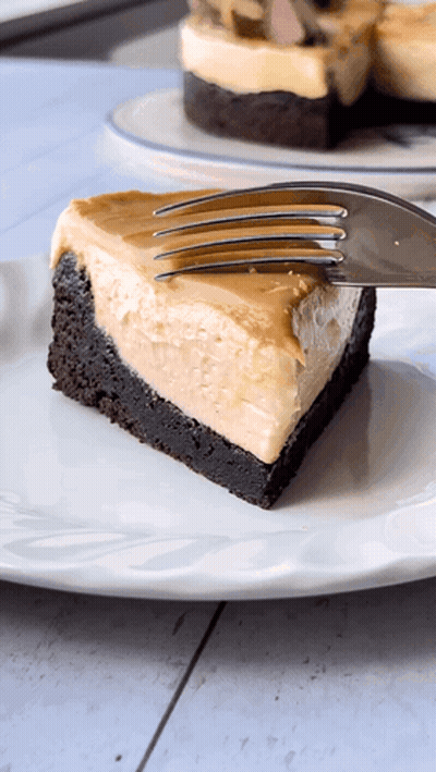 Fork Taking Bite Of Cheesecake GIF
