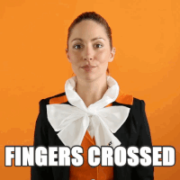 Formal Woman Fingers Crossed GIF