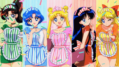 Four Anime Girls In Aprons Standing Together GIF