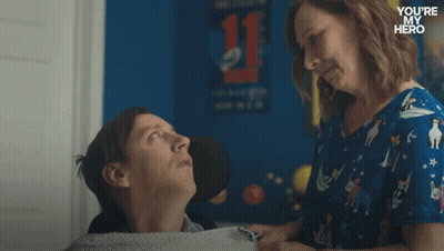 Four Cookies Baking In Oven On Wax Paper GIF