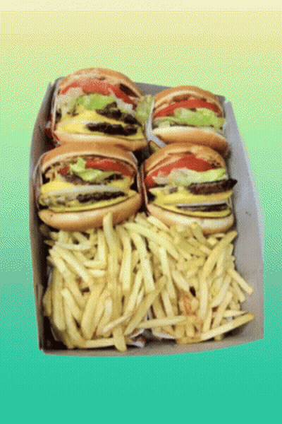 Four Hamburgers And French Fries In A Box On A Green Background GIF