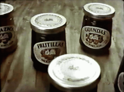 Four Jars Of Fruitillas And Guindas GIF