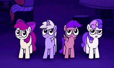 Four Ponies Standing Next To Each Other In A Dark Room GIF
