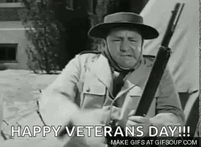 Four Soldiers Saluting At Cemetery With Freedom Isn't Free GIF