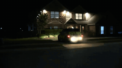 Four Toy Cars Lined Up With Megi85P Sign GIF