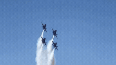 Four Us Navy Fighter Jets Fly In Formation GIF