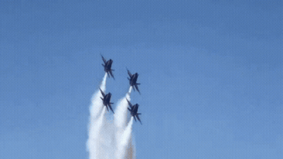 Four Us Navy Fighter Jets Fly In Formation GIF
