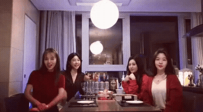 Four Women Sitting At Table GIF