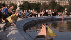 France Popular Tourist Spot Kid Playing In Water GIF