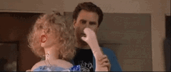 Frank The Tank Waiving With Doll GIF
