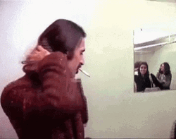 Frank Zappa Fixing Long Hair GIF