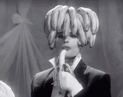 Freddie Mercury Eating Banana GIF