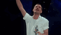 Freddie Mercury Singing His Album GIF
