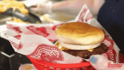 Freddy's Hamburger In Basket With Bun And Cheese GIF