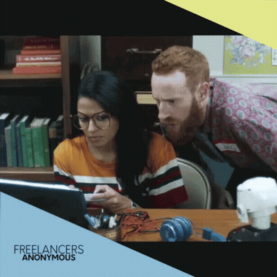 Freelancers Anonymous Ad Man And Woman Looking At Tablet GIF