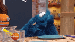 Frenzied Cookie Monster Gobbling Cookies GIF
