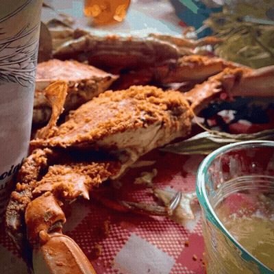 Fried Crab Beside Cup Saying Oysters GIF