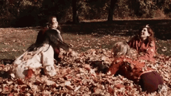 Friends Playing Falling Leaves GIF