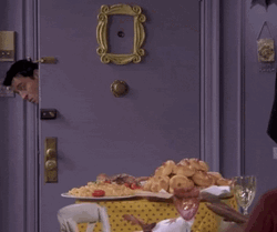 Friends Thanksgiving Joey Peeking At Food GIF