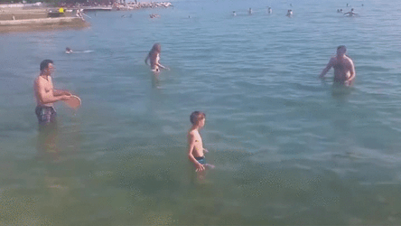Frisbee Fun At Sea GIF